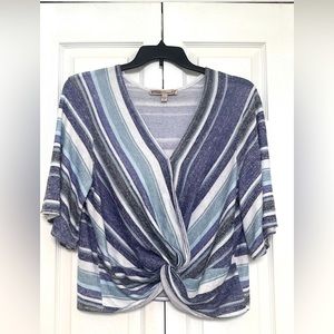 Short sleeve top, size large juniors, like new , worn only a few times .